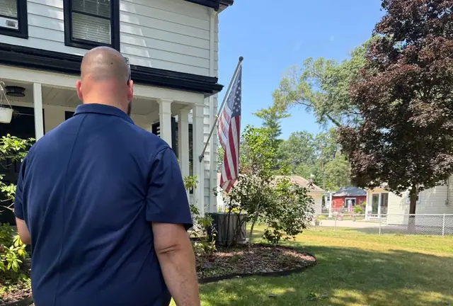 Commodore HVAC technician arriving at a Toledo home for a heat pump service call
